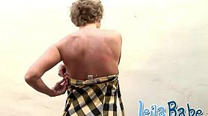 Leila Babe Sits On Chair For Striptease, Exposing Big Tits Outdoors