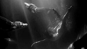 Lana del rey performs blue jeans in a bikini and jeans outfit