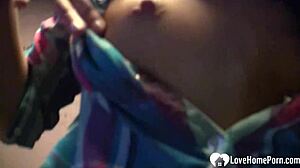 Young babe strips and teases her shaved pussy solo.