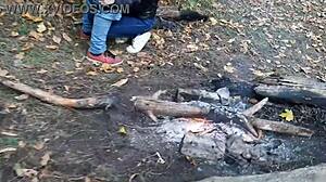 Beautiful lesbian girls enjoy public sex by forest fire