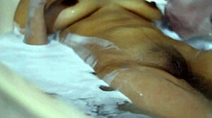 Student Kisses Boyfriend Passionately in Apartment