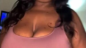 Big Ebony Tits Tease With Subtle Allure