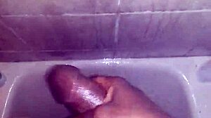 Jerking monster cock in shower leads to cum explosion