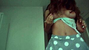 Busty Brunette Feels Exposed as She Strips and Shows Her Pierced Pussy