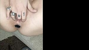 She plays with dildo in pussy and butt plug in ass