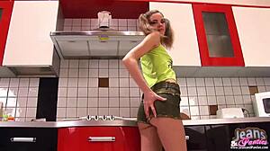 this petite teen babe struggles with her skinny jeans fetish in an amateur video