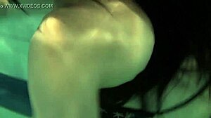 brunette teen kristina andreeva swims naked in the pool