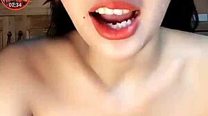 She shows off her big tits in a tempting way.