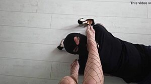 What secrets hide under her fishnet stockings and feet?