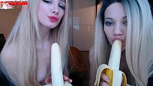 Two sexy girlfriends suck bananas
