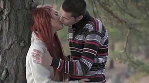 Teen Couple Kissing in Intimate Bedroom Moment