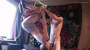 young girl sucking in suspension, intriguing facial