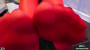 toes wiggling enticingly in red shiny pantyhose