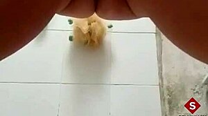 Warming up in the bathtub by fingering myself with toys