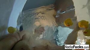 sexy nadia takes a bath with some rubber duckies masturbating