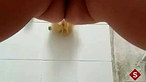 Warming up in the bathtub by fingering myself with toys