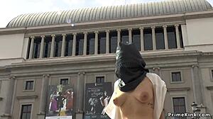 Gagged busty Spanish slut dominated in public