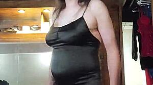 Just being naughty, modeling dresses in part 6. This ladyboy loves showing off!