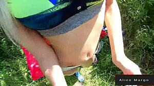 In the outdoors, an athletic blonde bends over for doggystyle fucking with a monster cock.