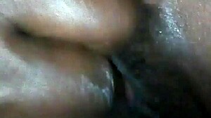 rubbing oil on ebony milf