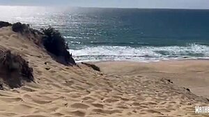 Trans woman fucks young busty girl bareback on public beach.