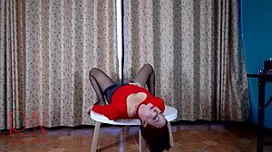 the housewife in pantyhose and heels does a striptease at the round table, ripping her clothes in this amateur scene