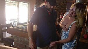 Blonde waitress jerks barman at holiday resort.