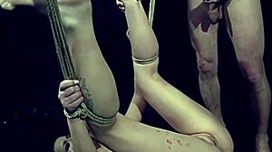 Beautiful slut bound in master's dungeon gets plowed