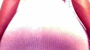 Oh wow, get an upskirt peek at her pussy in that thong and skirt!