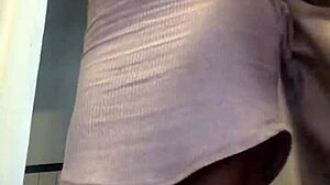 Oh wow, get an upskirt peek at her pussy in that thong and skirt!