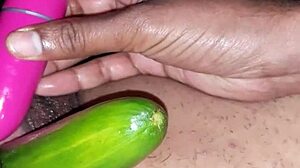 sexy indian wife uses vibrator and cucumber on her oiled pussy
