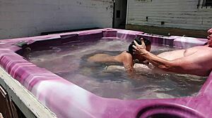 dayanara relaxes in the hot tub main 2