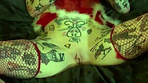 Tattooed milf achieves bold solo orgasm on Christmas.