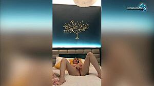 Passionate milf fondles wet pussy on camera