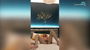 Passionate milf fondles wet pussy on camera