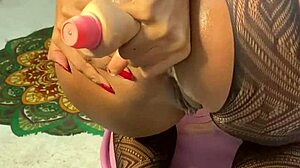 tattooed cute amateur masturbates her silicone pussy to orgasm close up