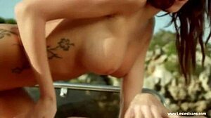 Horny lesbian couple licks each other passionately