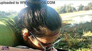 a wife gives a blowjob to her friend at the lake in public, leading to orgasm