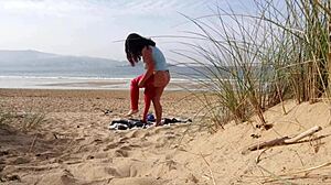 Curvy milf caught changing and exercising on beach