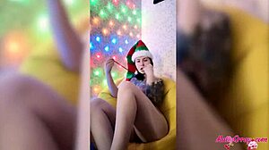 After the Christmas party, the hot babe passionately plays with her pussy using sex toys, reaching female orgasm.