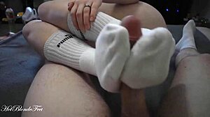 Sexy footjob in long socks with Miley Grey and her monster cock. 👣💦