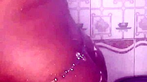 Black thick ebony woman fucks and dances in the shower