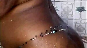 Black thick ebony woman fucks and dances in the shower
