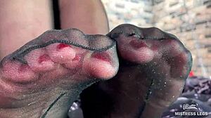 Goddess feet and toes in cute black pantyhose close up