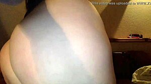 This young milf with big tits and chubby figure is quite something