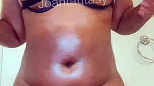 Joanfantasy gets all oiled up with buttplug in her ass as amateur