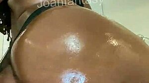 Joanfantasy gets all oiled up with buttplug in her ass as amateur