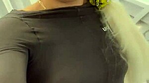 Blonde teases by undressing 😘. Sexy tattoo babe plays dress-up.