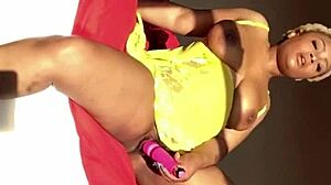 ebony wife enjoys a solo session with her shaved pussy, reaching orgasm