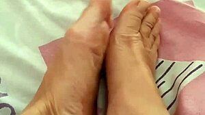 Stockings and foot play with mature Maria